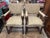 Louis XIII style open arm chairs with highly detailed carving. Character heads acting as arm rests. Barely twist...