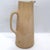 DETAILS A scarce, antique Weller tall pitcher decorated on the side with a crane in flight from the Jap Birdimal line. The...