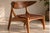 Klismos-Inspired Sculptural Lounge Chair A timeless fusion of classical Greek elegance and mid-century modern...