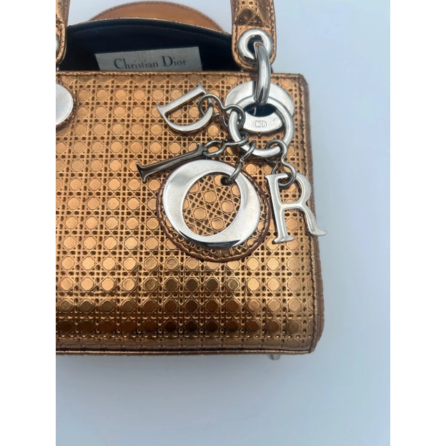 Christian Dior "Lady Dior Mini" Prototype Marketing. This beautiful and unique Dior bag is in really good condition, some...