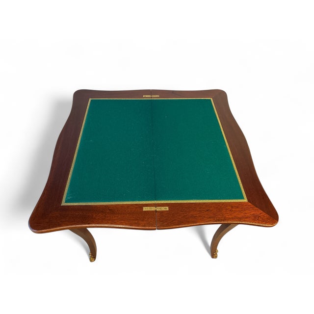 Elegant vintage Louis XV-style games table, made in Spain circa 1950s–1970s. Features a parquetry-inlaid top in mahogany...