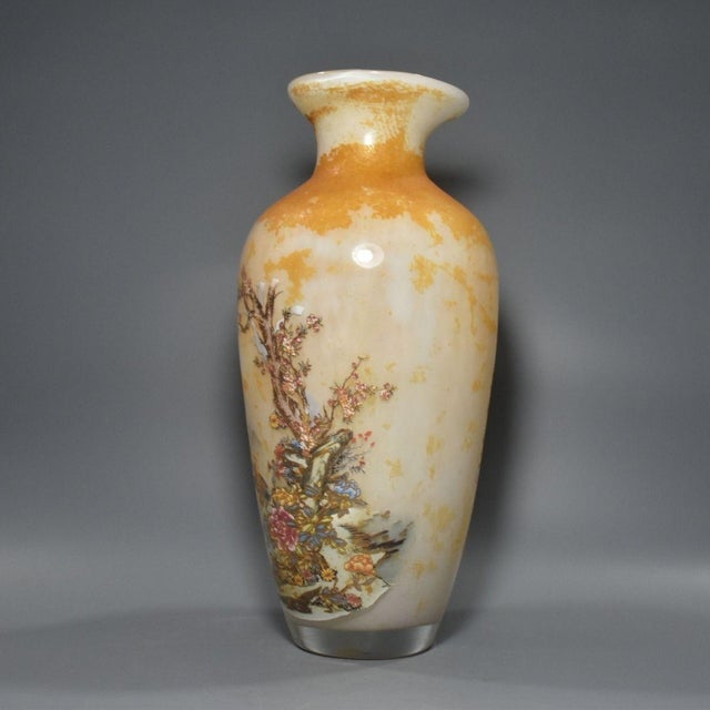 This vintage decorative vase is crafted from Liuli (a traditional translucent glass or crystal) and features intricate,...