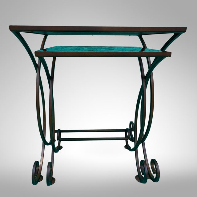 A richly colored pair of Pier 1 Imports Cerulean Mosaic Nesting Tables, documented in the company’s Summer 2014 Furniture...