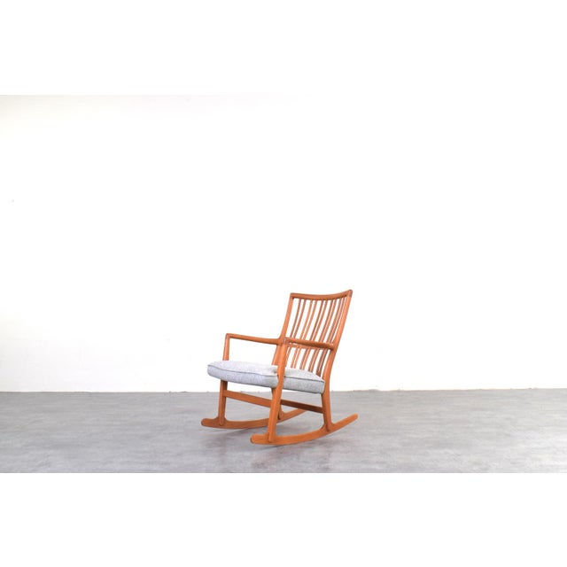 The ml33 rocking chair, designed by hans j. Wegner for the danish manufacturer a/s mikael laursen, is one of his early...