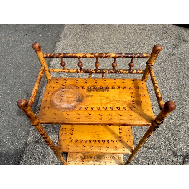 Beautiful Antique Burnt Bamboo 3 shelf etagere. Bamboo frame with wood shelves. The shelves have a design that is done by...