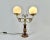 Vintage brass table lamp with two glass shades. This elegant table lamp is a combination of elegance and minimalism. A...