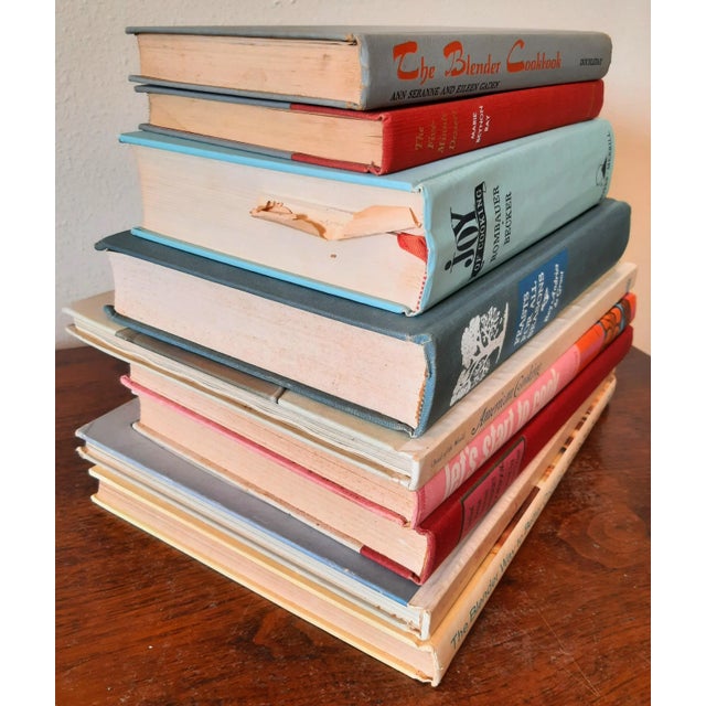Gorgeous set of vintage cookbooks. All pre-used and the majority pre 1970s. This is in the colors of red, blue, gray,...