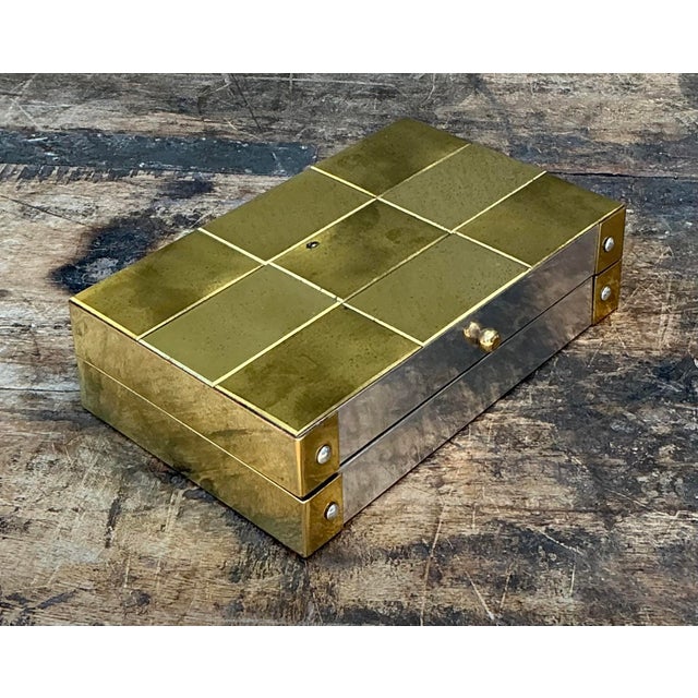 Elevate your vanity or executive desk with this sophisticated vintage mixed-metal keepsake box, a quintessential example...