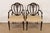 A gorgeous pair of Georgian or Regency style shield back armchairs or dining captain chairs In the manner of Baker...