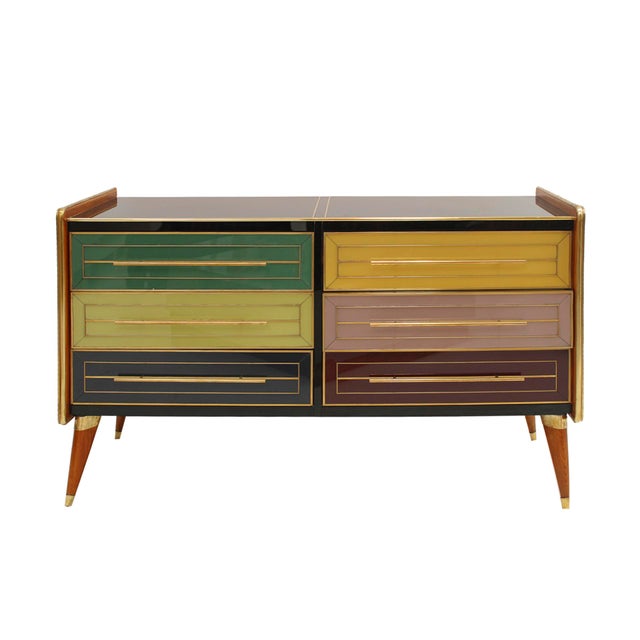 Stunning mid-century Italian sideboard with a striking design from the 1950s. This exquisite piece features a solid wood...