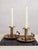 A striking pair of dragon handled chambersticks by Bradley and Hubbard, a Connecticut based company that what known for...