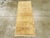 A vintage Turkish Sivas runner. Six rectangular panels, with yellow-gold outlines and beige centers, are the main...