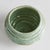 With a reactive glaze and hand finished ribbing detail, this charming sage green pot is a great find. Plant your favorite...