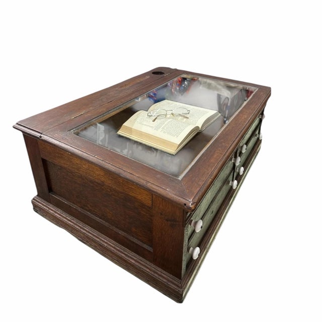 An evocative 19th-century schoolmaster’s desk, originally designed as a tabletop writing desk rather than a freestanding...