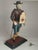Rare JVE Germania clock, Black Forest, 1950s. Male figure in traditional costume (wanderer/citizen, 18th century) with...