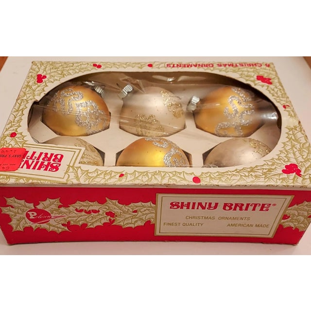 These rare 1960's stenciled blown glass ornaments are still in their original packaging. These bulb are in their original...