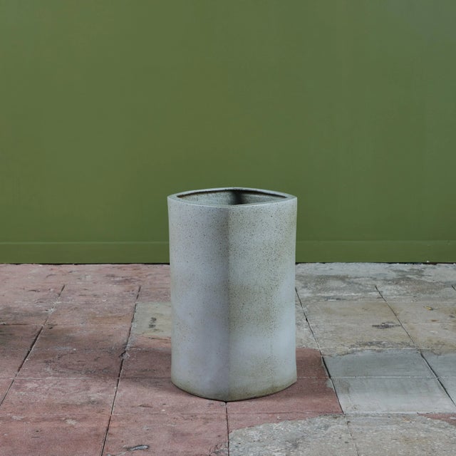 Glazed planter in in a gray speckle glaze by ceramics artist Marilyn Kay Austin for Architectural Pottery. This example,...