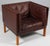 Illum Wikkelsø 1919-1999. Lounge chair, freestanding, upholstered in brown leather, loose cushions with down filling, oak...