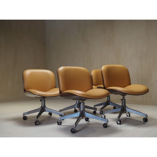 Elegant office chair designed by ico parisi for mim roma, an iconic example of italian mid-century craftsmanship. Part of...