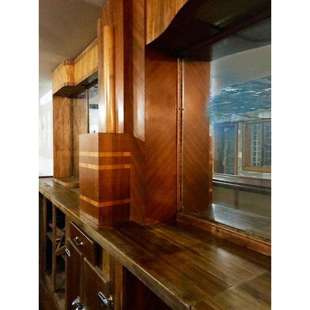 Beautifully restored antique circa 1940 Art Deco style wood and glass bar with decorative, multi-tonal veneer and inlay...