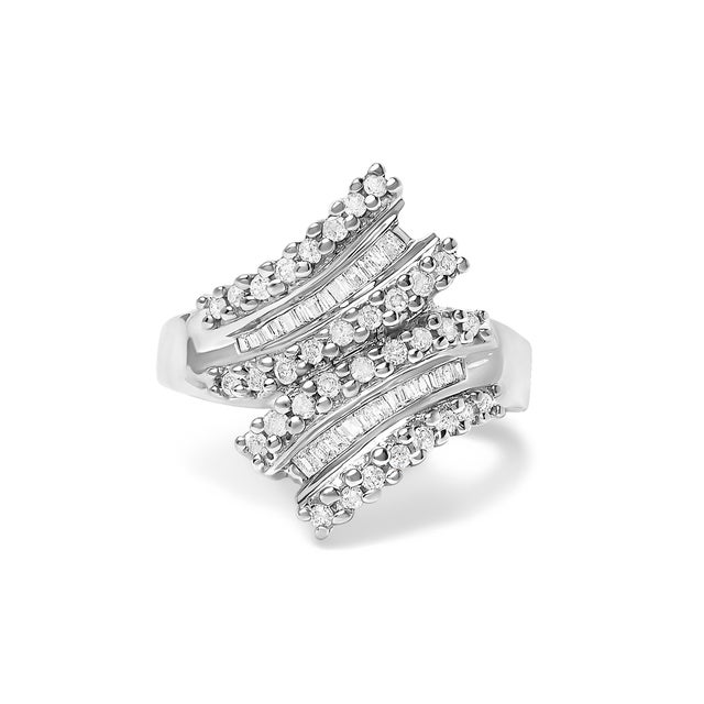 Slip on a whisper of motion and light. Sculpted in bright‑polished 10K white gold, this cocktail ring sweeps into an...