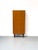 Minimalist cabinet with one door and three adjustable shelves This exclusive Danish piece of furniture was manufactured by...