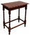 Antique English oak side table with deep red stain, pie crust top and four classic barley twist legs attached by four box...