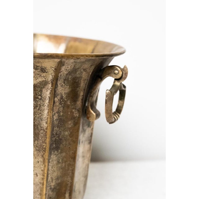 Antique silver-plated brass ice box, Made in Italy, 1940s. There are handcrafted ornaments at the base, including the...