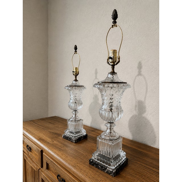 Offering a striking pair of vintage Paul Hanson table lamps featuring sculptural crystal bodies with dramatic swirling...