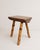 A charmingly characterful vintage rustic wooden stool that beautifully marries organic textures with classic mid-century...