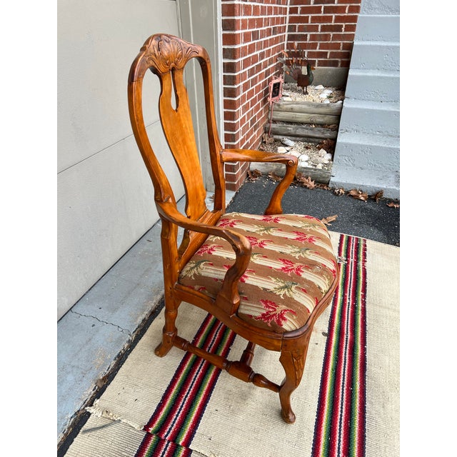 A Antique Country French Provincial Carved Armchair, 18th Century Made in France, in the 18th century. Probably 1770’s...