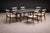 This set of six dining chairs, produced in Brazil in the 1950s, reflects the restrained elegance and structural lightness...