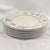 Add timeless elegance to your table with this beautiful set of seven Villeroy & Boch *Albertina* salad plates. Crafted in...