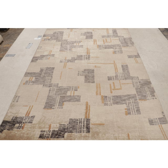 Hand knotted in wool and exotic yarn, this 6×9 abstract rug joins Rug & Kilim’s bold Modern Collection. Featuring a...