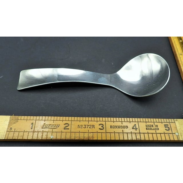 This marvelous vintage 1960s tea caddy or serving spoon is created in gorgeous sterling silver in the Sunset pattern [in...