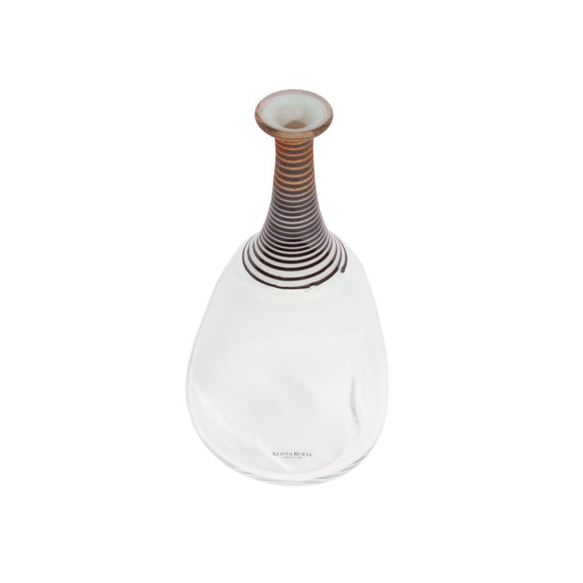 A glass "Spirit" vase designed by the Swedish artist and designer by Bertil Vallien (born 1938) for Kosta Boda. This vase...