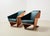 Pair of Taliesin 1 lounge chairs, designed by the architect Frank Lloyd Wright in 1949 for his own home. This pair is a...