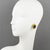 The renowned fashion house Sonia Rykiel Paris designed this remarkable pair of clip-on earrings. They flaunt a stunning...