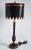 Vintage Chinoiserie style handpainted table lamp with Tole shade by AG Collection. The wooden lamp base is gilted with...