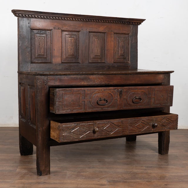 17th-century chestnut console or buffet with exceptionally deep patina and centuries of wear reflecting its early origins....