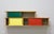 Wall-mounted bookcase by Charlotte Perriand, 1950s. Made in France, in solid wood and red, green, and yellow varnish. In...