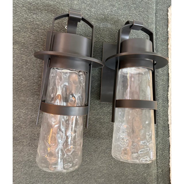 Design Plus Gallery presents a Pair of Large Balthus Sconces from Modern Forms. The sconces are cast from vintage...