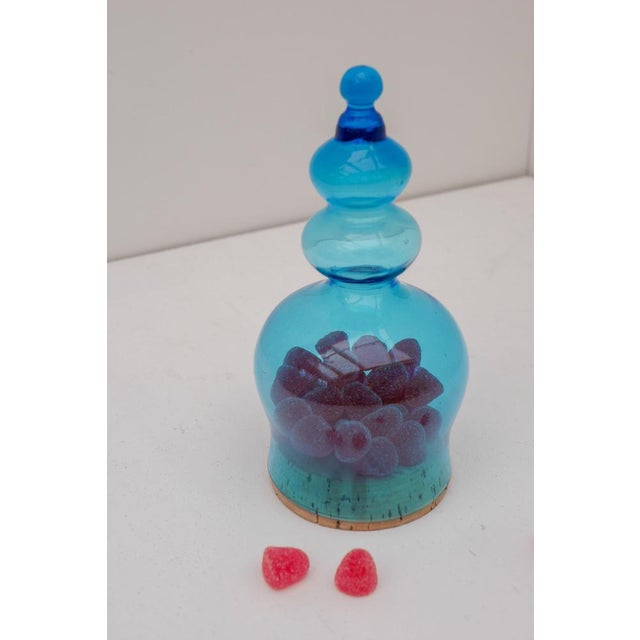 A rare and sculptural lidded glass vessel, known in Swedish as a Godisgömma ("candy hideaway"), designed by Bertil Vallien...