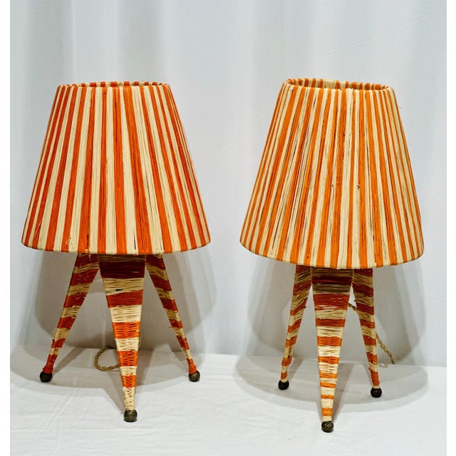 Whimsical striped pair of raffia table lamps from Morocco. Approx Measurements 11"W 11"D 19.5"H