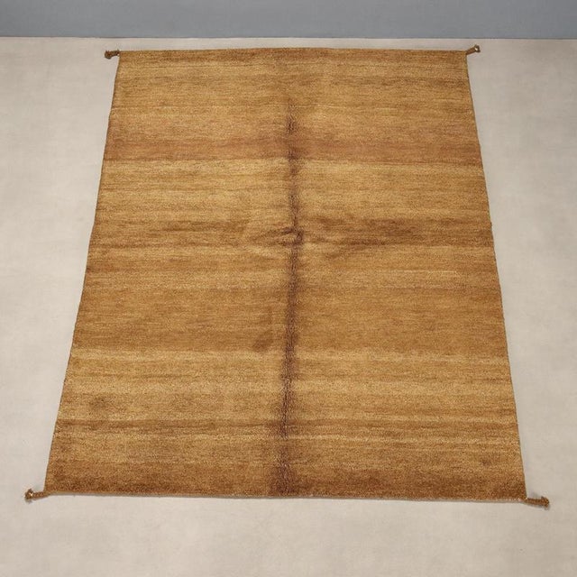 Gabbeh rug in wool, large knot and hand-made. This piece is attributed to the mentioned designer/maker. It has no...