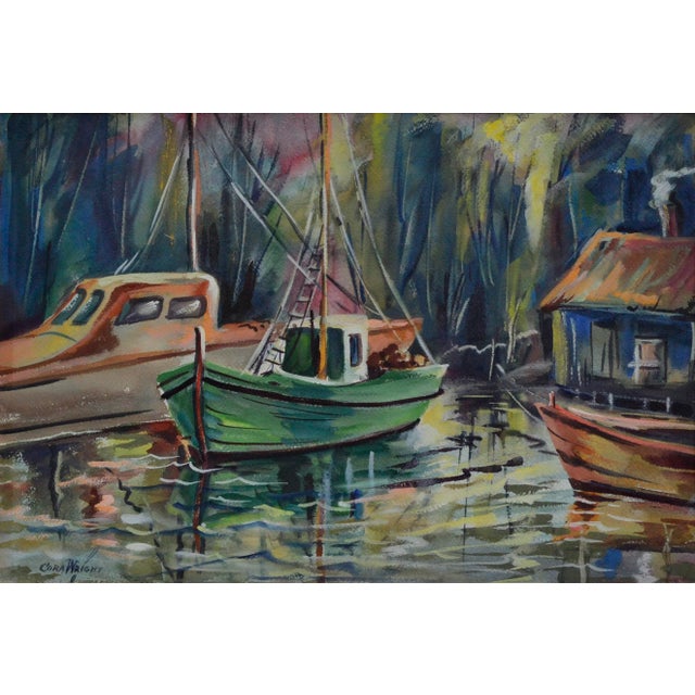 Vibrant watercolor of three fishing boats by Cora Alice Akers Wright (American, 1908-1992). which are anchored in a small...