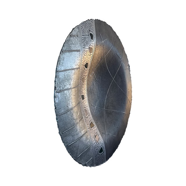 This circular wall sculpture is an authentic studio work by Paperlight, handcrafted in 2004. A striking example of...