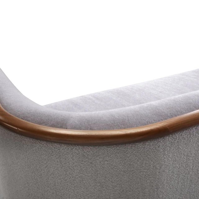 The Dennis Miller Associates Sofa by Jiun Ho is a refined balance of softness and structure, where tailored upholstery...