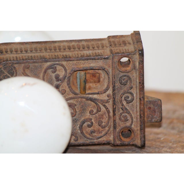 From the 1870s or 1880s, this set of doorknobs feature the original white porcelain knobs and the cast iron rim lock. This...