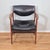 This is good looking vintage midcentury modern arm chair in the Gunlocke style. The chair has a solid walnut frame, with...